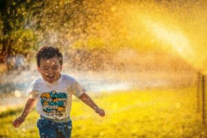 boy getting wet